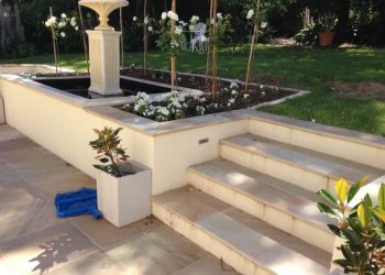 lands 3 Lush landscaped garden with stone pathway